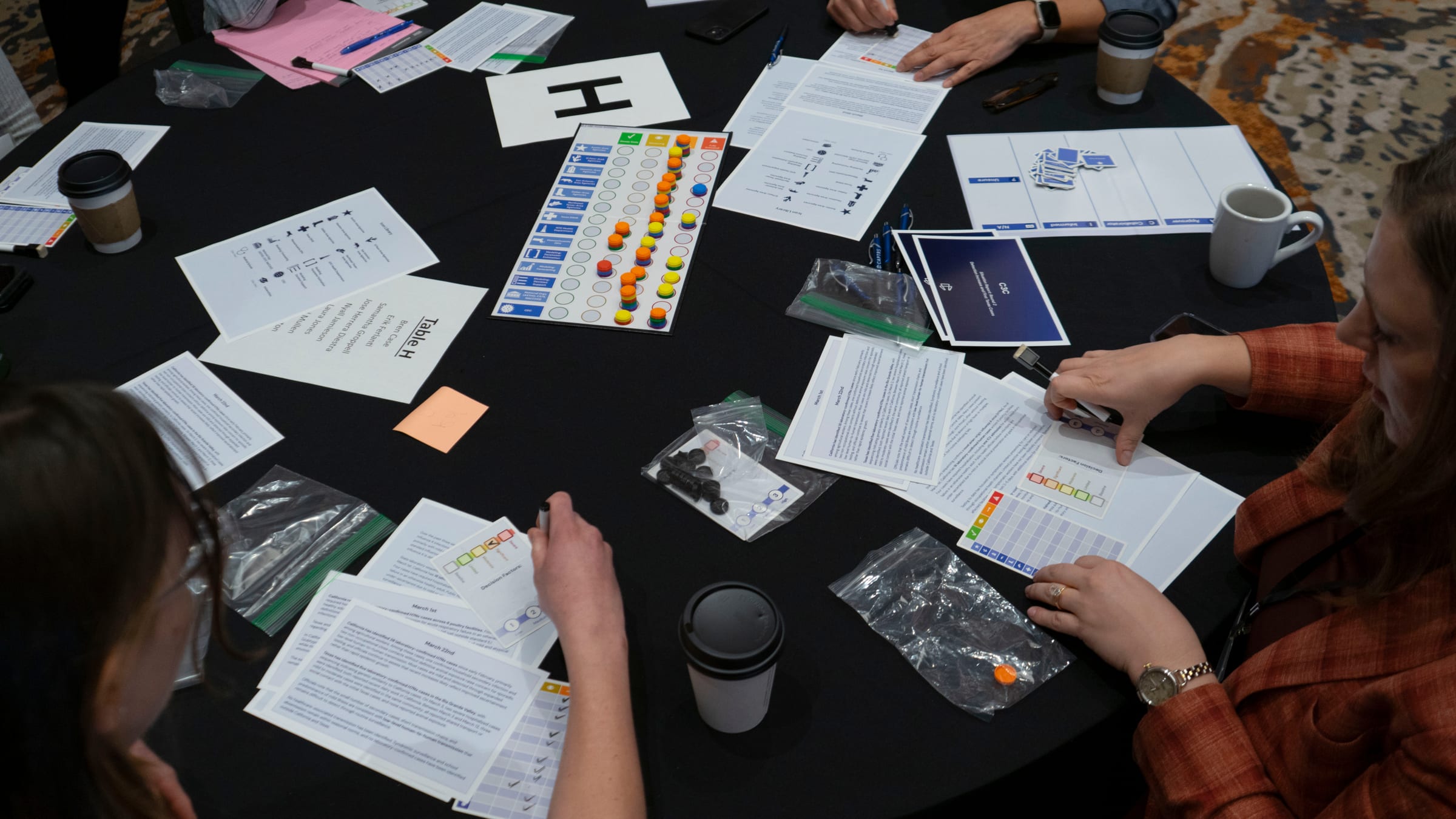Simulation game board with pieces on a table
